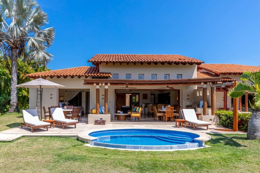 Las Palmas Villa 5 the villa's porch, round spa, and lounge row — Punta Mita, Mexico