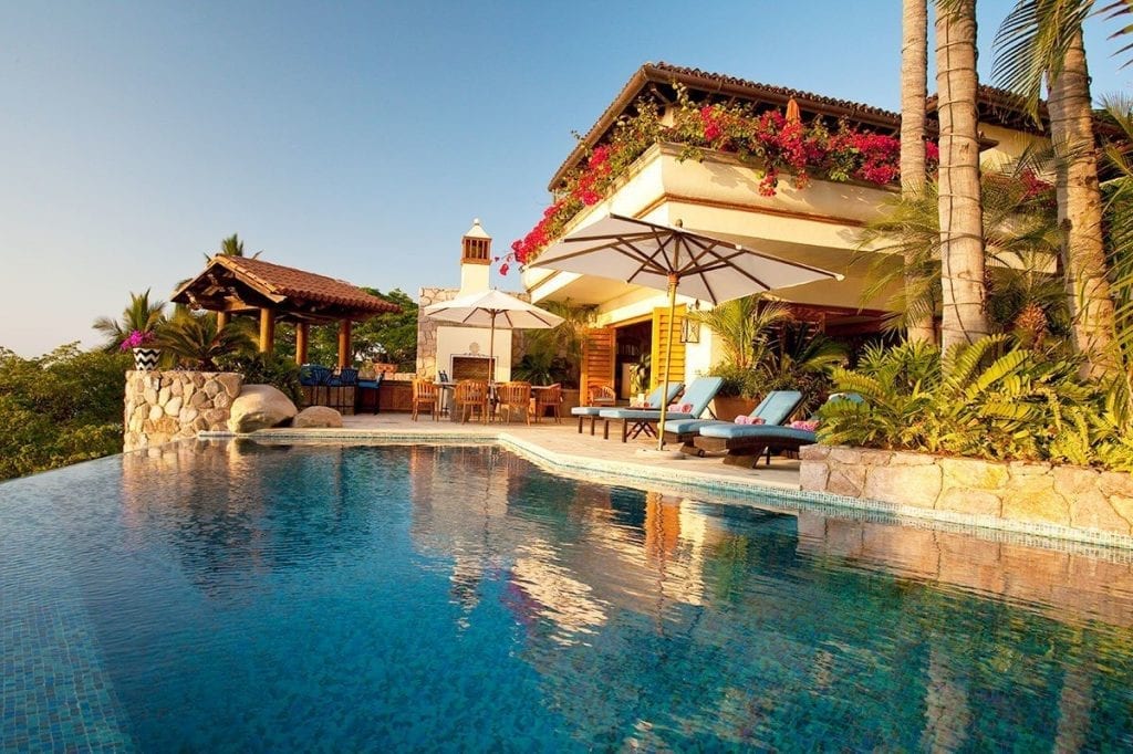 Villa Amapas North swimming pool beside covered terraces — Puerto Vallarta, Mexico