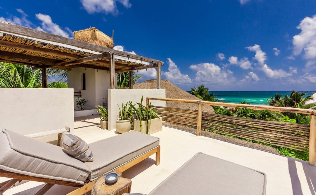 Casa Chakte roof loungers turned to the turquoise band — Tulum, Mexico