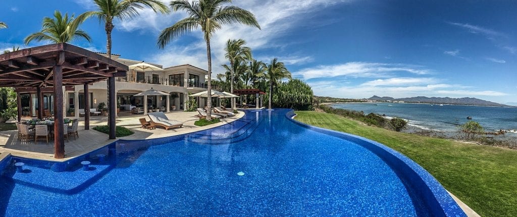 Casa La Vida the pool running the lawn toward the coastline — Punta Mita, Mexico