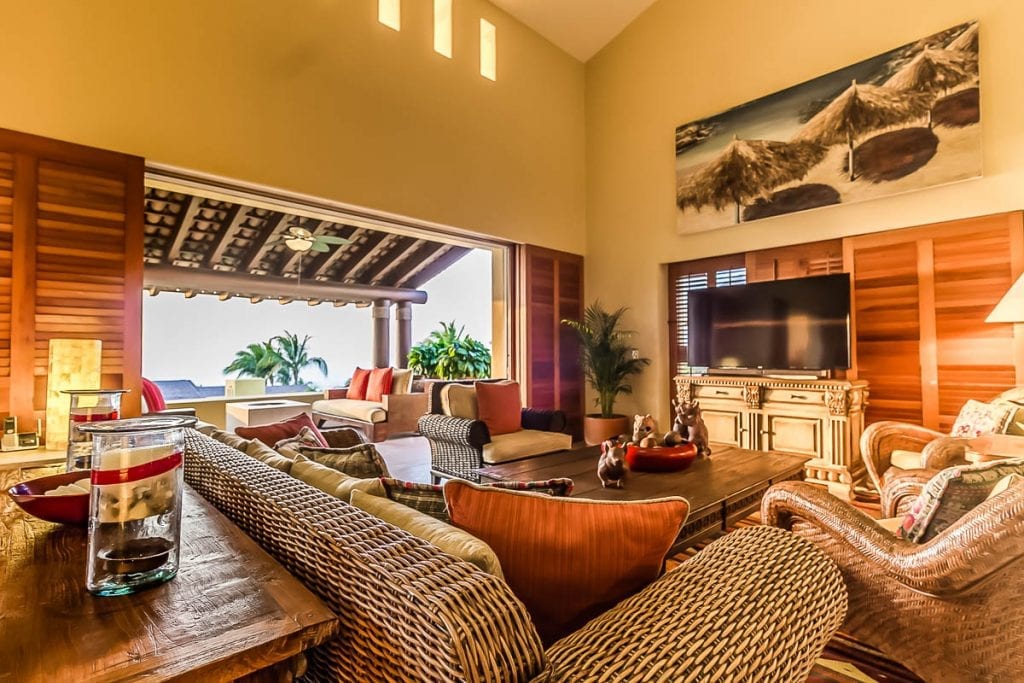 Villa Sirena cushions circling beneath the dune painting — Punta Mita, Mexico