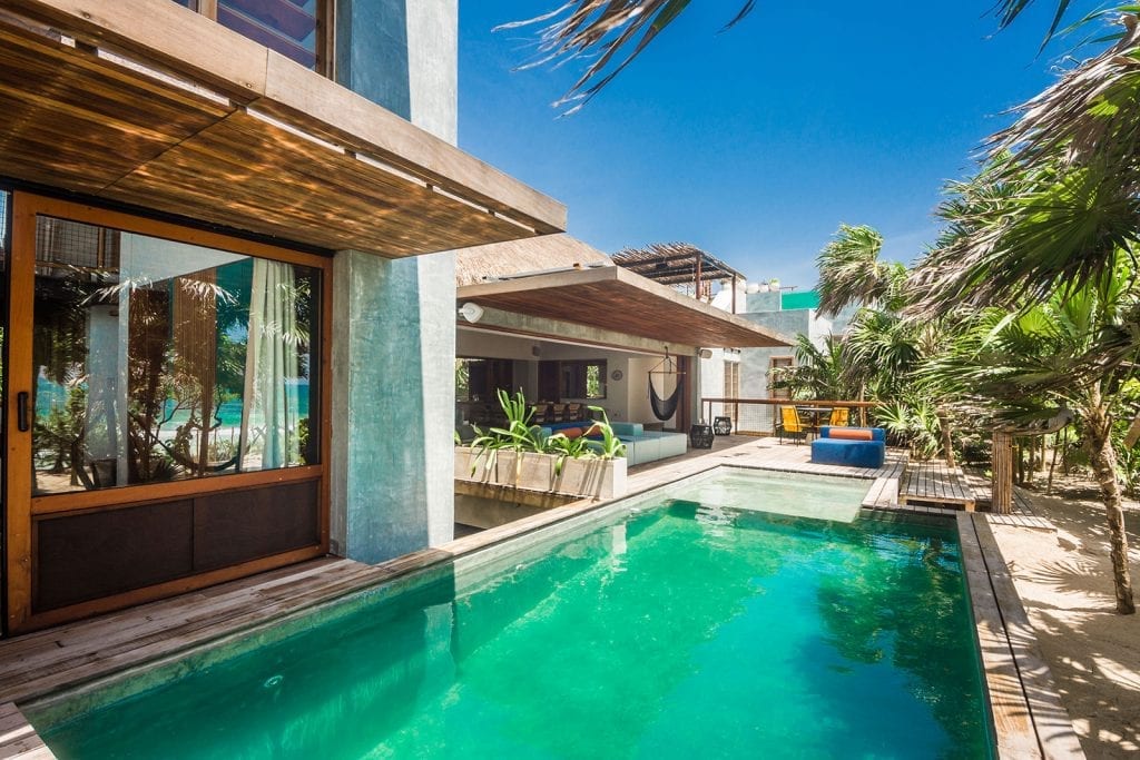 Casa Mam exterior view of the villa beside the pool — Tulum, Mexico