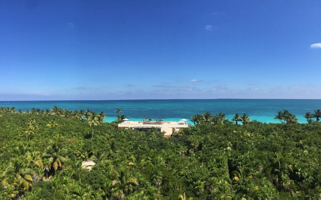 Villa Na’iik aerial of jungle and a white beach on the turquoise coast — Tulum, Mexico