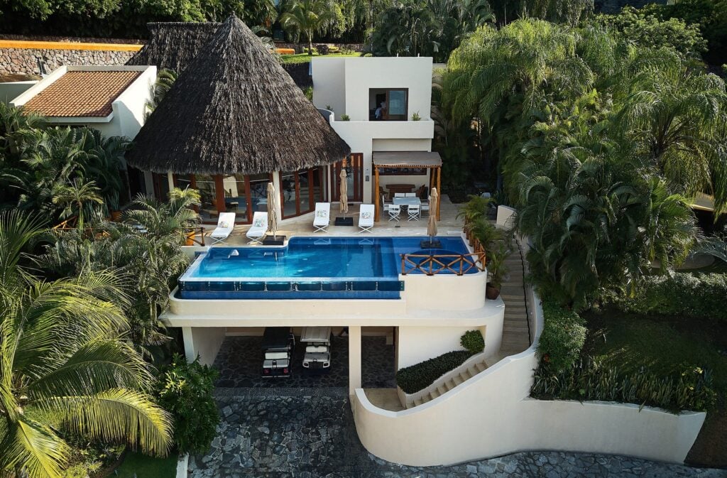 Casa Palapa aerial view of the pool terrace above the covered driveway — Punta Mita Nayarit, Mexico