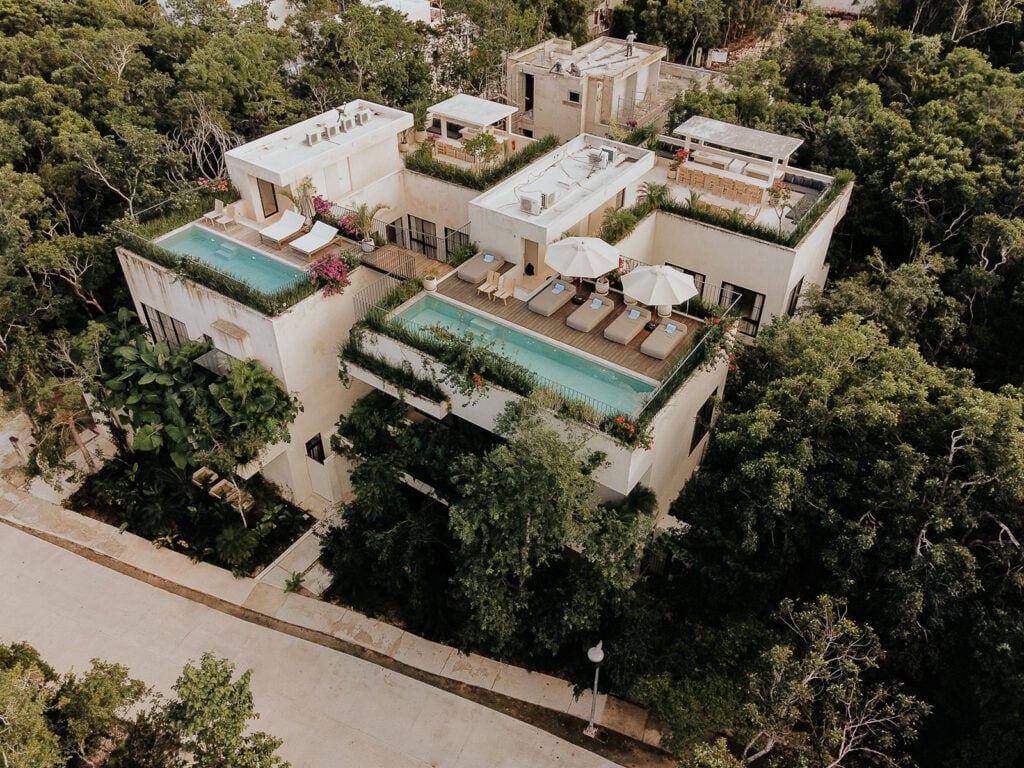Villa Imperia villa rooftops and pools seen from above — Tulum, Mexico