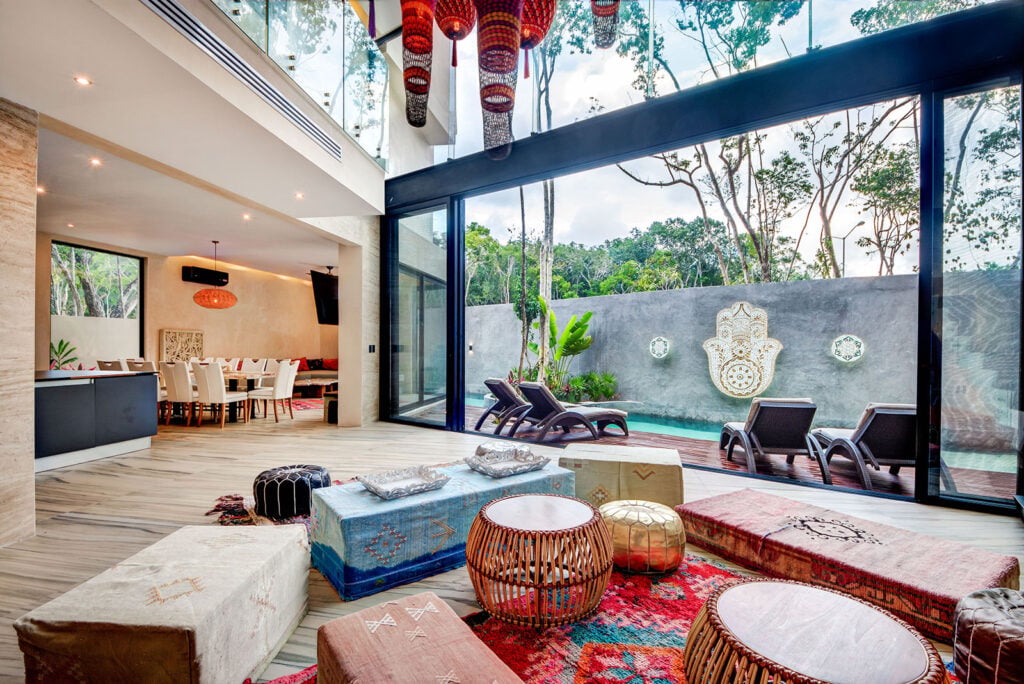 Tulum Dream Villa open living and dining opening onto the pool terrace — Tulum, Mexico