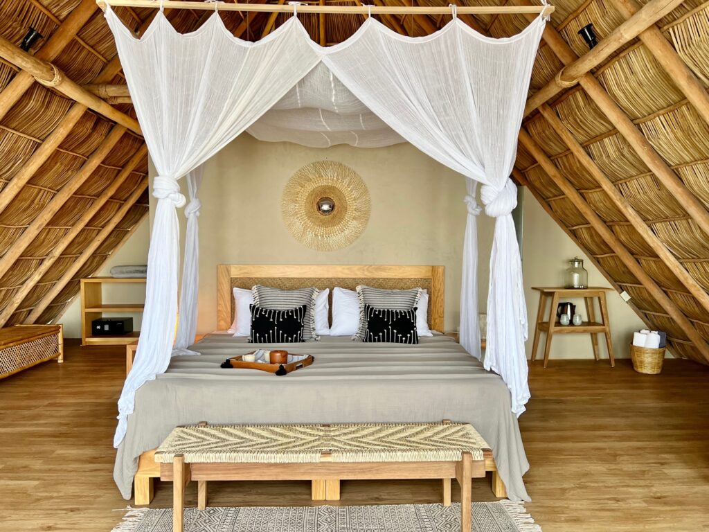 Palapa master bedroom featuring a king-size bed in Villa Mixto, a premier Puerto Vallarta event venue and wedding villa.