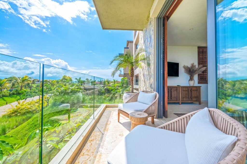 Condo Ensueno bedroom terrace with sliding doors open to golf greens — Punta Mita Nayarit, Mexico