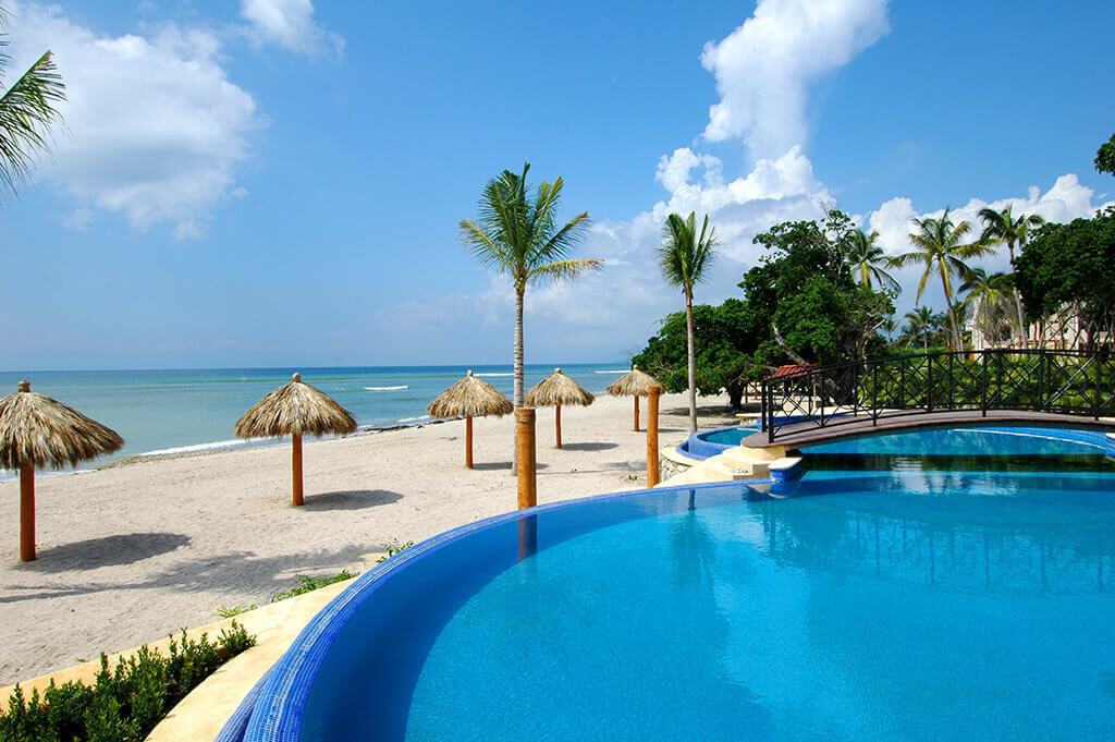 Hacienda de Mita's close proximity to the pristine beach, dotted with cozy beach huts and a sparkling adjacent pool.