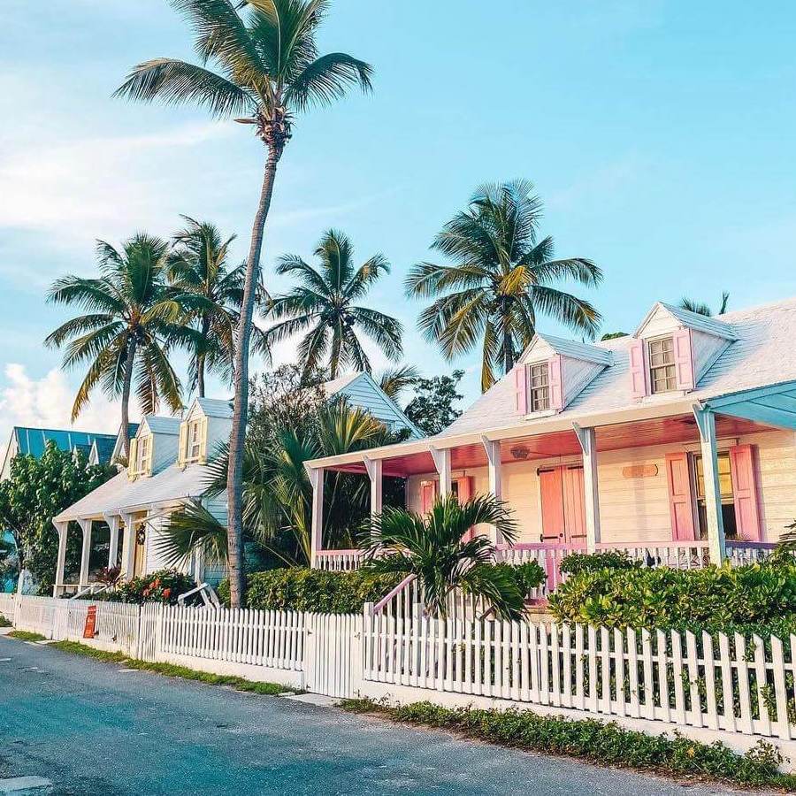Typical colorful house and cobblestone street in Harbour Island, Bahamas.