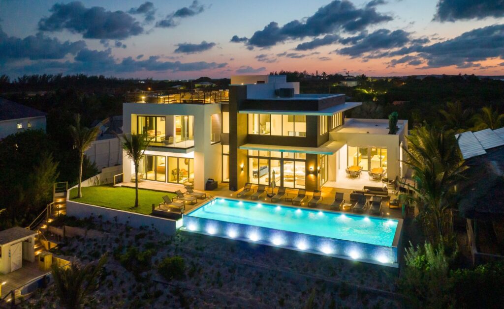 Front view of the Modern Villa in Harbour Island, Bahamas, displaying its sleek design and pool.