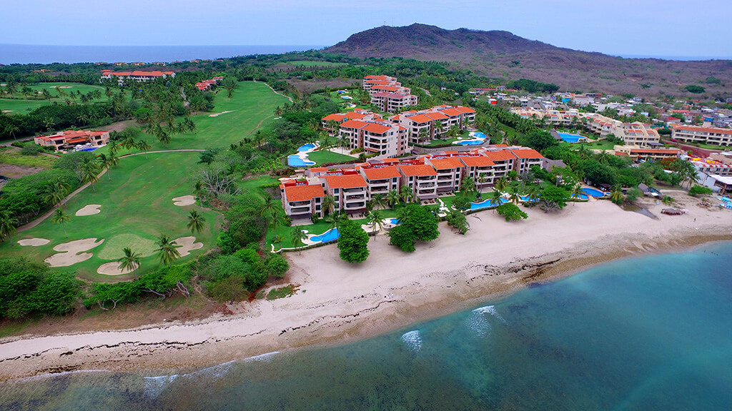 Aerial shot of the Hacienda de Mita luxury development with Punta Mita's coastline in the backdrop.