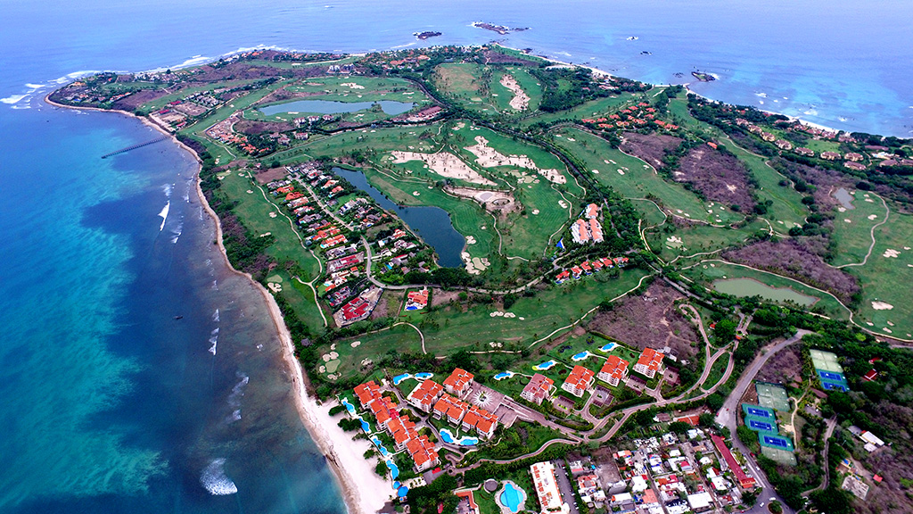 Aerial panorama of the Punta Mita peninsula, revealing its coastal contours and natural beauty.