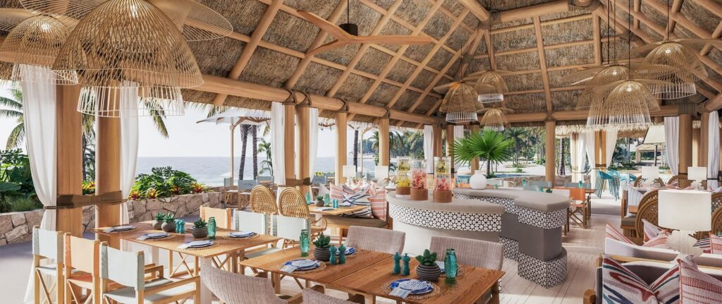 Luxurious interior dining space at Omni Pontoque Resort, Punta de Mita, featuring elegant furnishings and mood lighting.