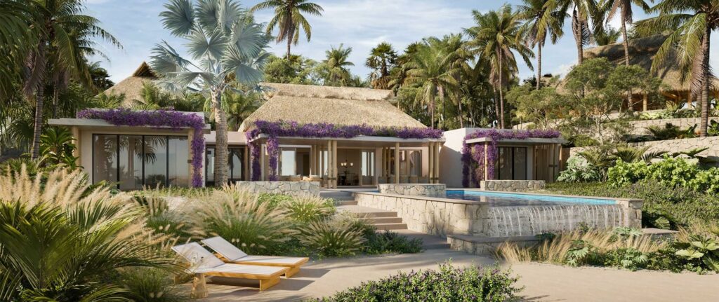 Frontal perspective of a luxurious villa at Omni Pontoque Resort, Punta de Mita, framed by verdant landscapes.