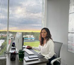 A dedicated villa specialist working at the Villa Experience headquarters, expertly coordinating luxurious vacation stays for clients.