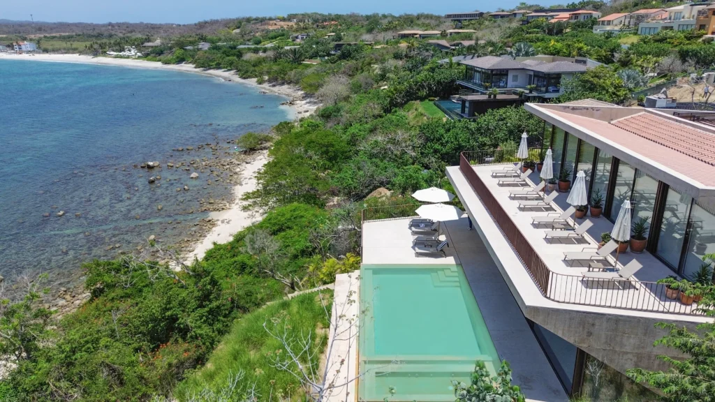 Casa Morgandez aerial view of the pool and rocky coastline — Punta Mita Nayarit, Mexico