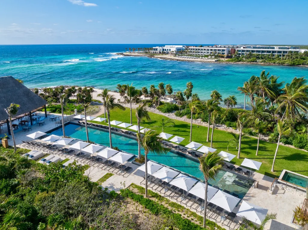 Villa Tulkal aerial of the pool, lawn, and beach palapa — Tulum, Mexico