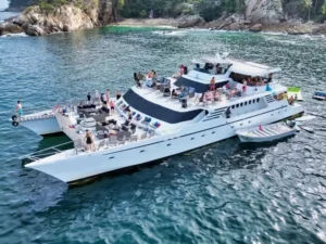 Luxury yacht anchored in Banderas Bay during a Yelapa waterfall tour in Puerto Vallarta