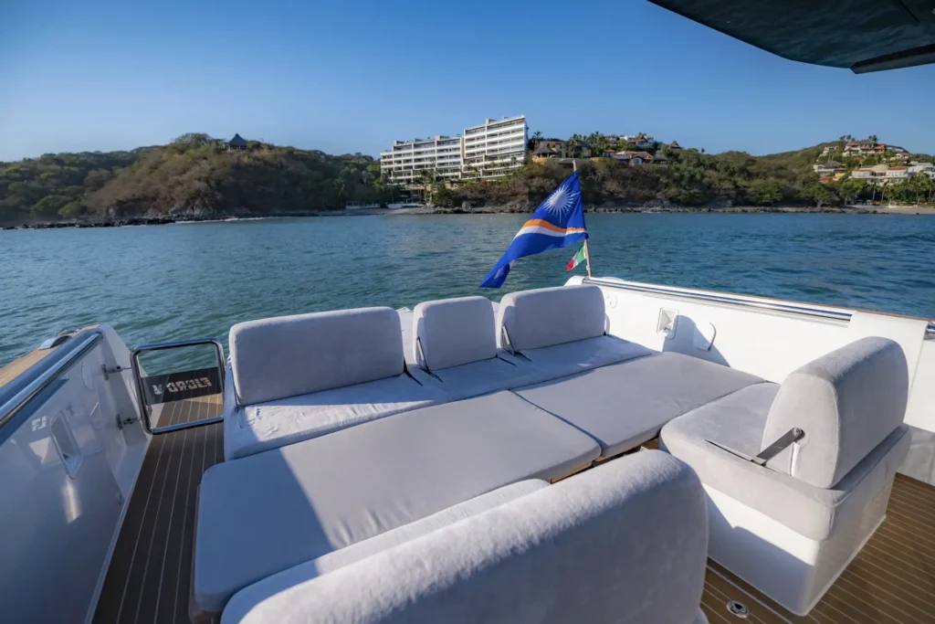 White cushioned seating on a yacht's foredeck off Punta de Mita