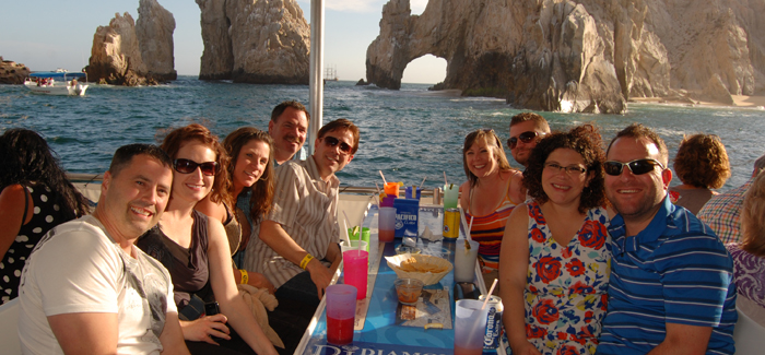 Glass bottom boat tour past El Arco sea lion colony and Lovers Beach