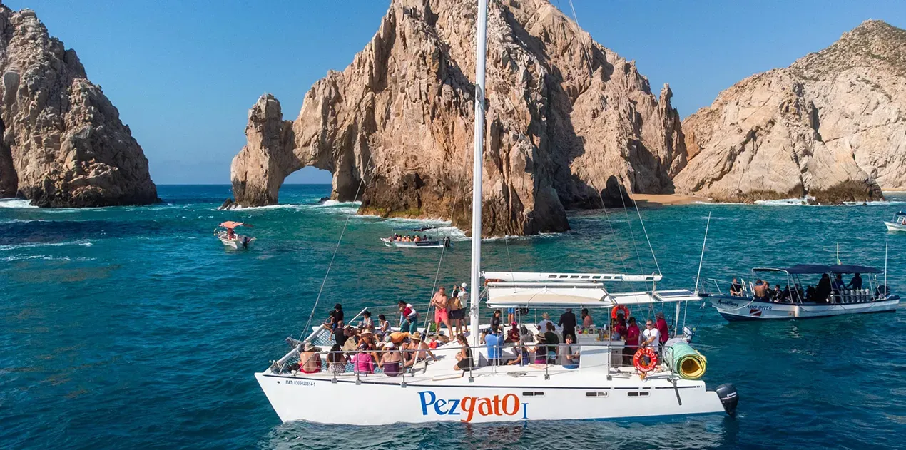 Luxury catamaran two bay snorkeling tour with lunch and unlimited drinks Cabo San Lucas