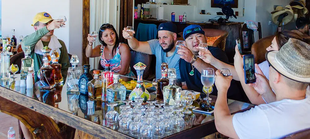 Zip line canopy tour soaring over desert canyon with ocean views Cabo San Lucas