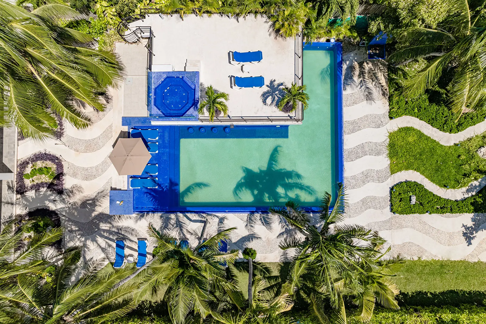 Villa Bellamar top-down view of rectangular pool and garden paths — Half Moon Bay, Akumal, Mexico