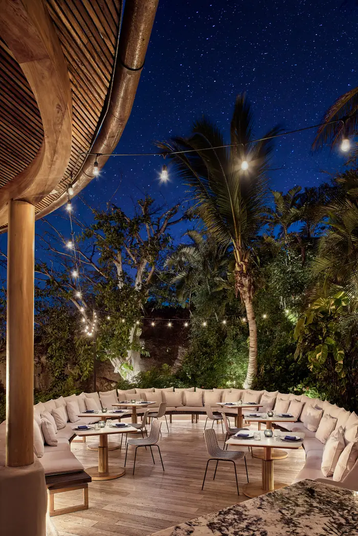 The lounge at Bahía, Four Seasons Punta Mita, lit at night