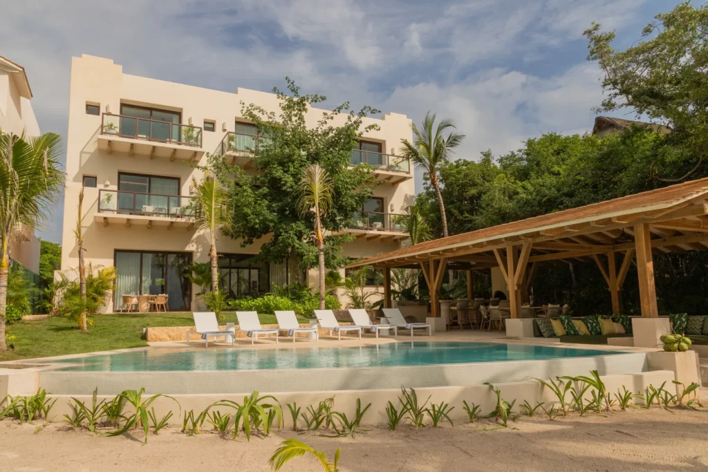 Heated pool and palapa in front of Casa Ceiba on the Sac Bajo shore