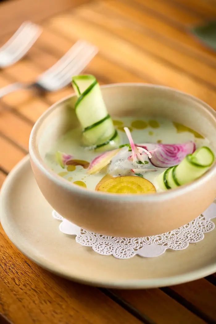 A chilled soup in a white bowl at NAEF, Punta de Mita