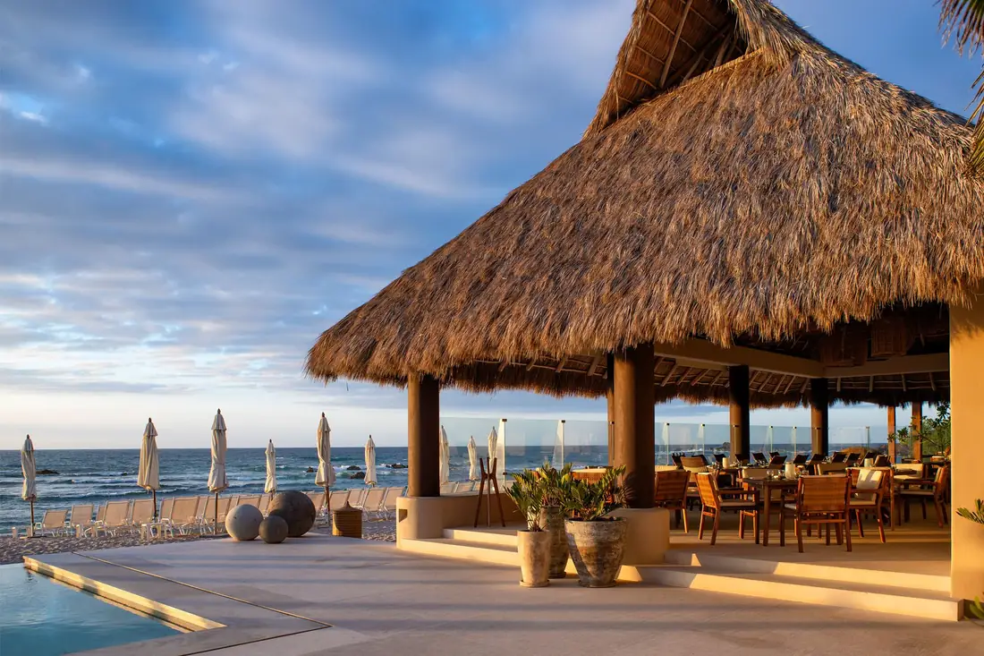 The palapa at Pacífico Beach Club in Punta Mita, above the pool and the Pacific