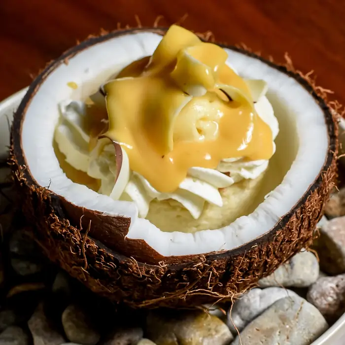 A dessert served in a coconut shell at Zicatela, Punta de Mita